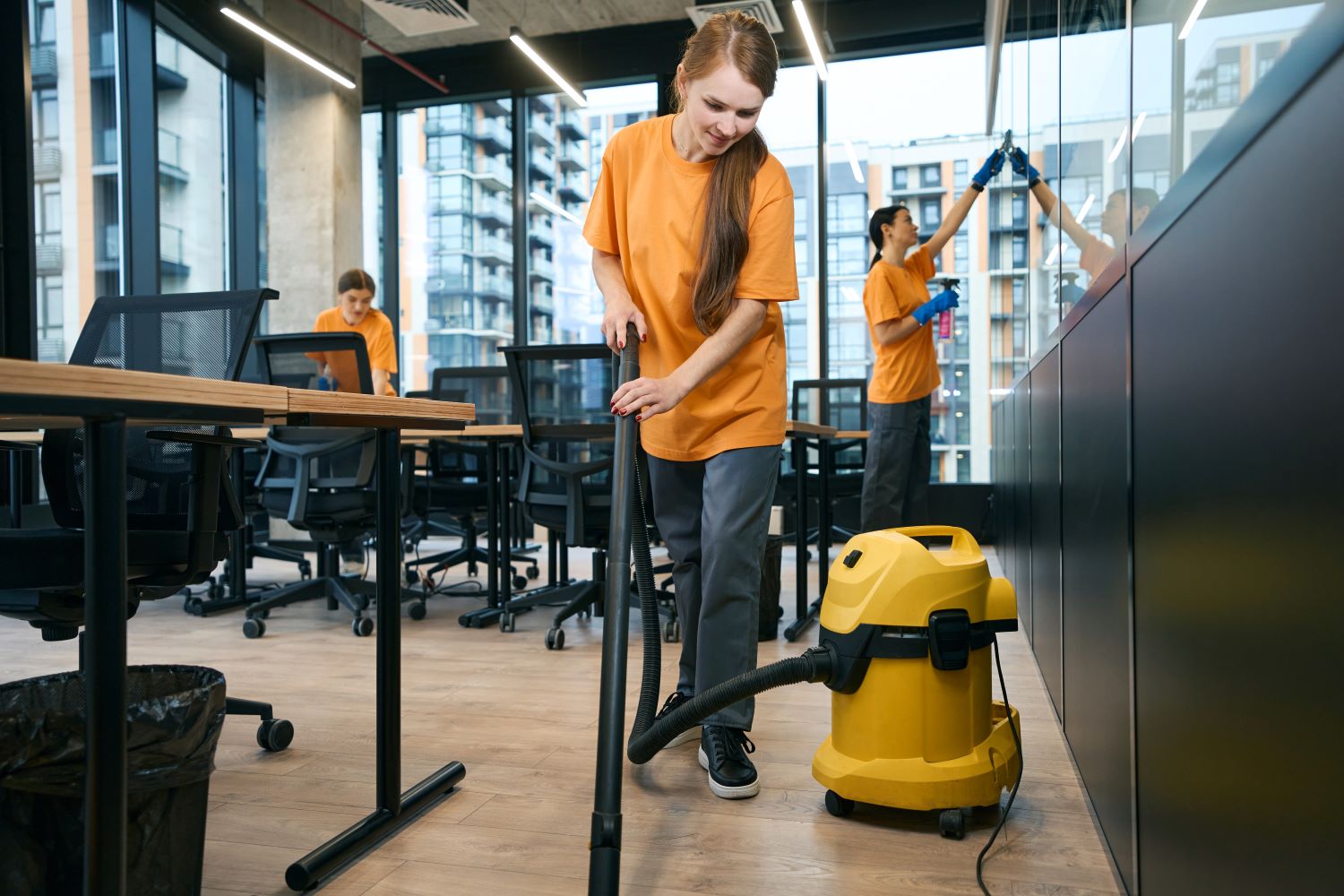 female-cleaning-company-team-in-overalls-clean